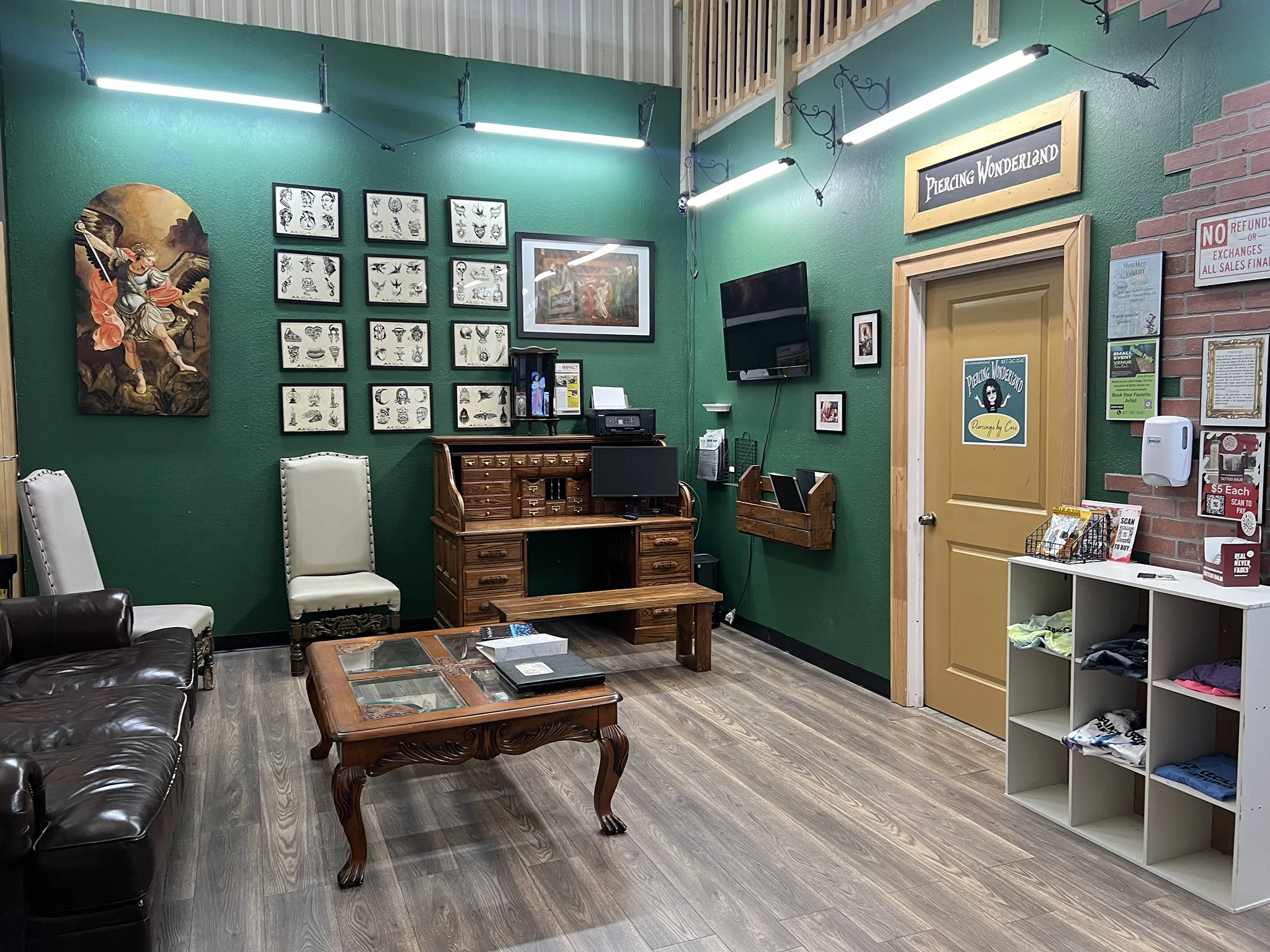 Studio lobby with green walls and vintage furniture