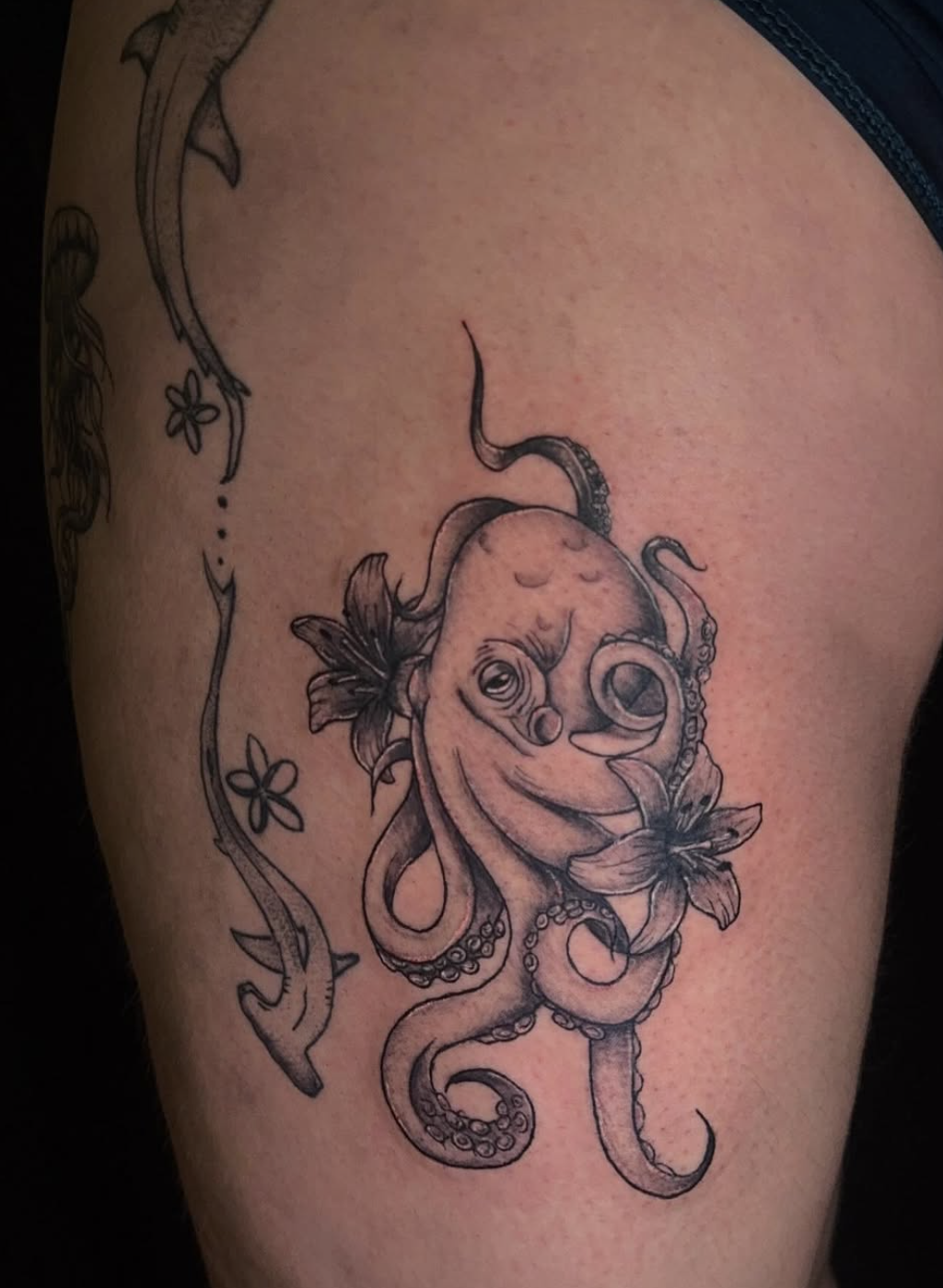 Octopus and flowers tattoo